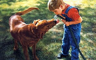 boy drinking water from hose beside adult brown dog